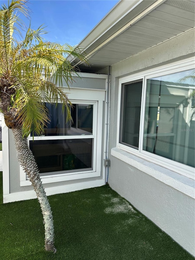 142 Reef Rd, South Daytona, FL 32119 - exterior view of stucco siding