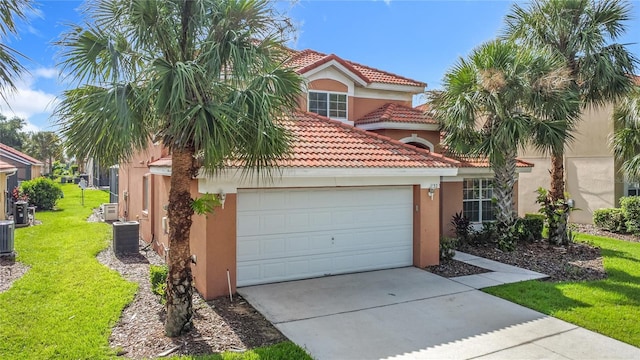 132 Cordova Ave, Davenport, FL 33897 - mediterranean / spanish-style house with driveway, stucco siding, a front lawn, a tile roof, and an attached garage