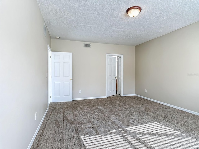 132 Cordova Ave, Davenport, FL 33897 - unfurnished bedroom with carpet and a textured ceiling