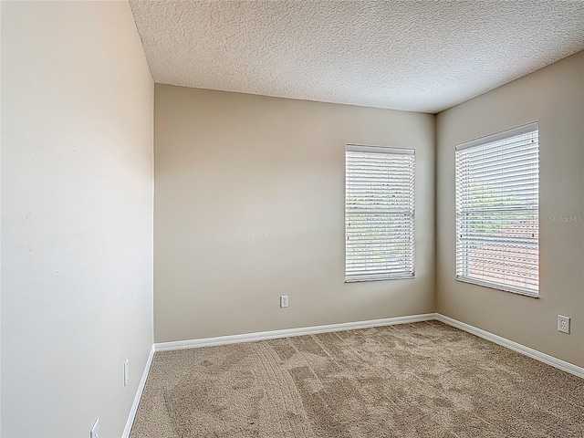 132 Cordova Ave, Davenport, FL 33897 - empty room featuring carpet and a textured ceiling