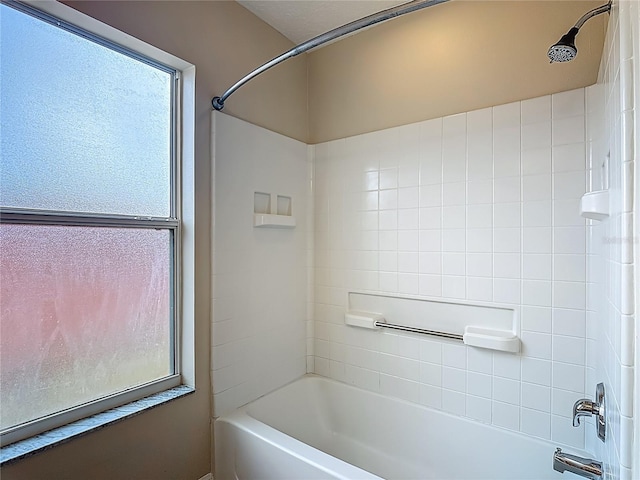 132 Cordova Ave, Davenport, FL 33897 - bathroom with plenty of natural light and bathing tub / shower combination