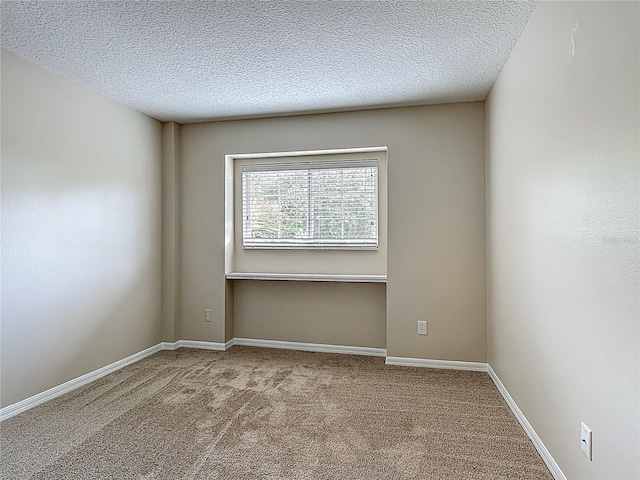 132 Cordova Ave, Davenport, FL 33897 - carpeted spare room featuring a textured ceiling and baseboards
