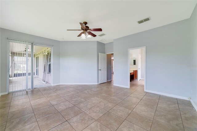 2298 The Oaks Blvd, Kissimmee, FL 34746 - empty room featuring ceiling fan and light tile patterned flooring