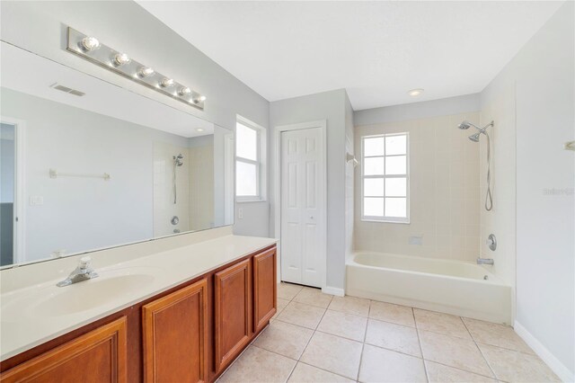 2298 The Oaks Blvd, Kissimmee, FL 34746 - bathroom featuring vanity, shower / washtub combination, tile patterned flooring, and recessed lighting