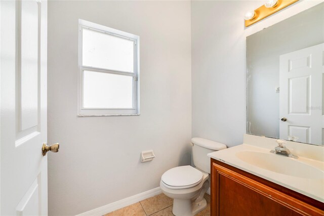 2298 The Oaks Blvd, Kissimmee, FL 34746 - half bath featuring vanity and tile patterned flooring