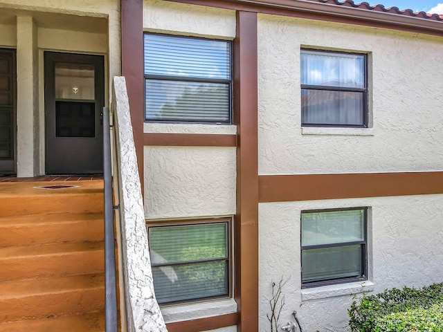 6140 Burnside Cir Unit 204, Orlando, FL 32822 - exterior view of stucco siding