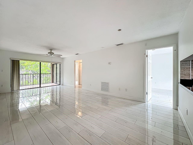 6140 Burnside Cir Unit 204, Orlando, FL 32822 - unfurnished room featuring ceiling fan and light wood-type flooring