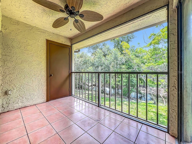 6140 Burnside Cir Unit 204, Orlando, FL 32822 - balcony featuring ceiling fan