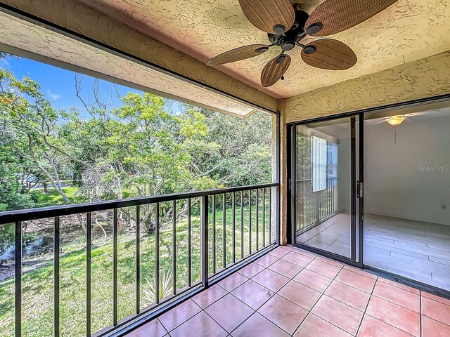 6140 Burnside Cir Unit 204, Orlando, FL 32822 - balcony featuring ceiling fan