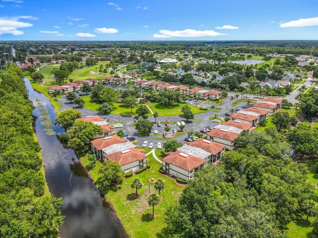 6140 Burnside Cir Unit 204, Orlando, FL 32822 - aerial perspective of suburban area featuring a large body of water