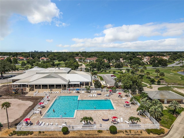 6140 Burnside Cir Unit 204, Orlando, FL 32822 - community pool featuring a patio and view of golf course