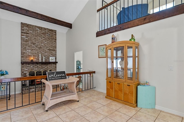 5630 Spring Run Ave, Orlando, FL 32819 - kitchen with high vaulted ceiling, tile patterned flooring, and a fireplace