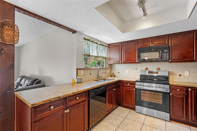5630 Spring Run Ave, Orlando, FL 32819 - kitchen featuring black appliances, reddish brown cabinets, light tile patterned floors, decorative backsplash, and a textured ceiling