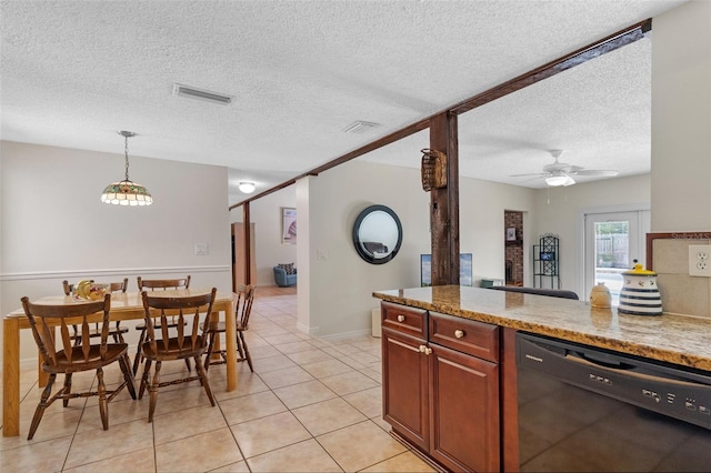 5630 Spring Run Ave, Orlando, FL 32819 - kitchen with dishwasher, a textured ceiling, light tile patterned floors, hanging light fixtures, and a ceiling fan