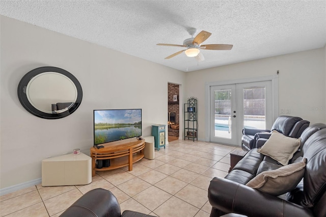 5630 Spring Run Ave, Orlando, FL 32819 - living area with french doors, light tile patterned floors, ceiling fan, and a textured ceiling