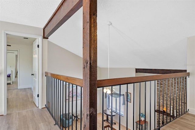 5630 Spring Run Ave, Orlando, FL 32819 - hallway featuring wood finished floors and baseboards