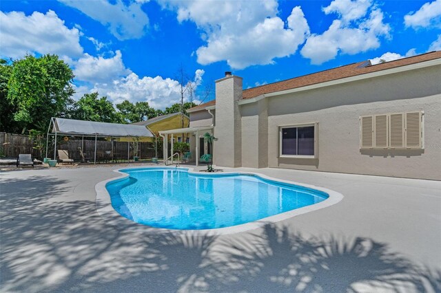 5630 Spring Run Ave, Orlando, FL 32819 - view of swimming pool with a patio area