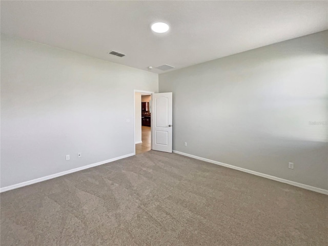 2587 Isabela Ter, Kissimmee, FL 34743 - unfurnished room featuring carpet floors and baseboards
