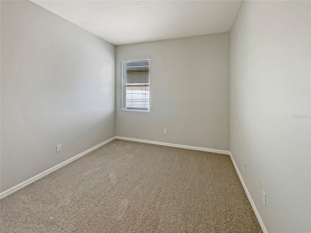 2587 Isabela Ter, Kissimmee, FL 34743 - unfurnished room featuring baseboards and carpet floors