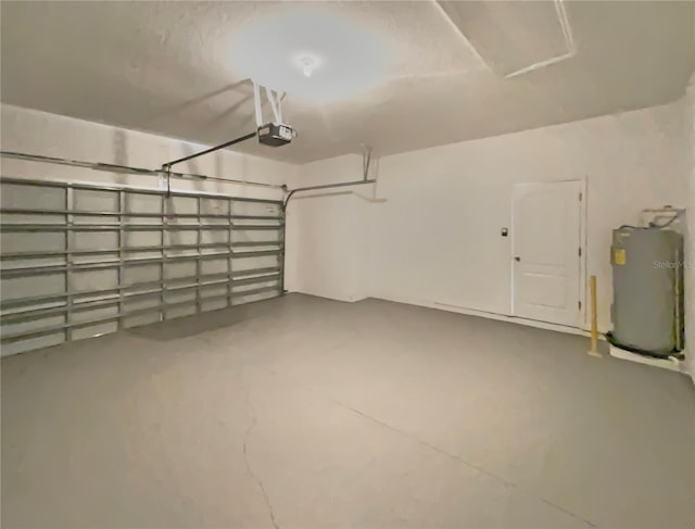 2587 Isabela Ter, Kissimmee, FL 34743 - garage with water heater and a garage door opener