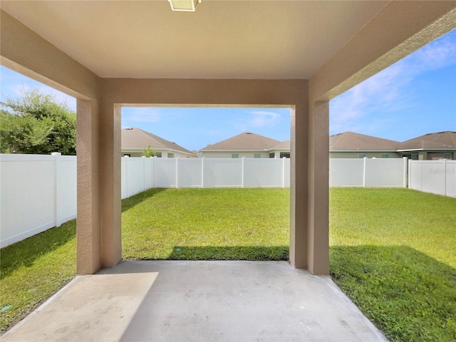 2587 Isabela Ter, Kissimmee, FL 34743 - fenced backyard with a patio area