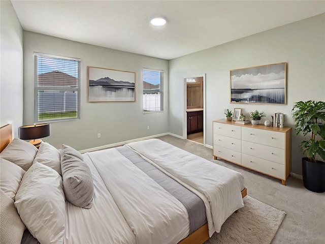 2587 Isabela Ter, Kissimmee, FL 34743 - bedroom with light colored carpet and connected bathroom