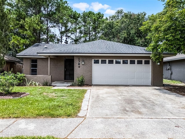 1384 La Paloma Cir, Winter Springs, FL 32708 - single story home featuring a garage, driveway, a front yard, roof with shingles, and stucco siding