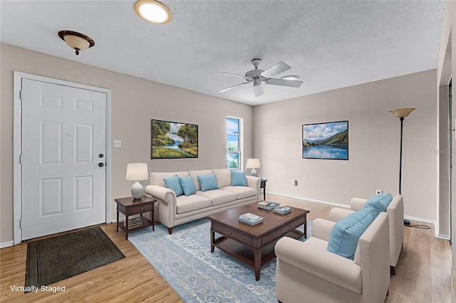 1384 La Paloma Cir, Winter Springs, FL 32708 - living room with light wood-style floors and ceiling fan