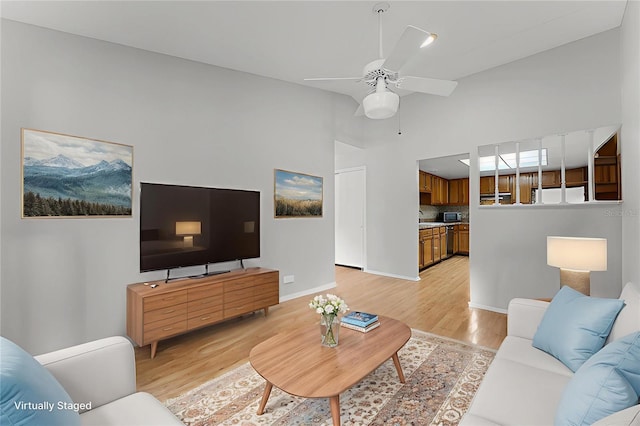 1384 La Paloma Cir, Winter Springs, FL 32708 - living room with light wood finished floors and ceiling fan