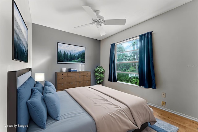 1384 La Paloma Cir, Winter Springs, FL 32708 - bedroom featuring wood finished floors and a ceiling fan
