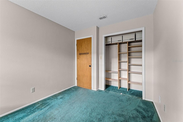 1384 La Paloma Cir, Winter Springs, FL 32708 - unfurnished bedroom featuring carpet flooring, a closet, and a textured ceiling