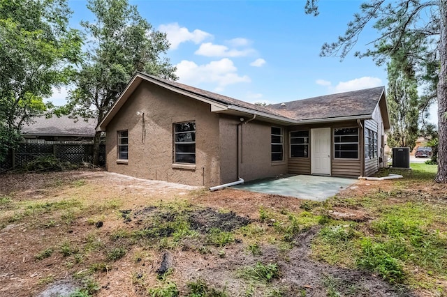 1384 La Paloma Cir, Winter Springs, FL 32708 - rear view of house featuring a patio and stucco siding