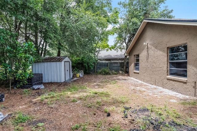 1384 La Paloma Cir, Winter Springs, FL 32708 - view of yard with a storage unit