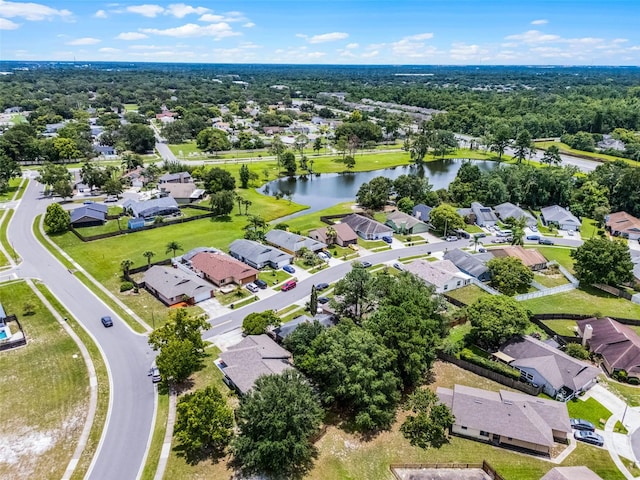 1384 La Paloma Cir, Winter Springs, FL 32708 - aerial view of residential area with a nearby body of water