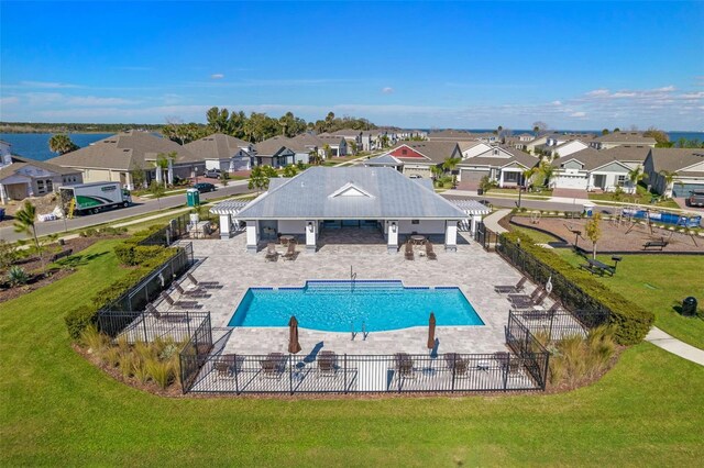 1219 Foltz Loop, Oakland, FL 34787 - community pool featuring a residential view and a patio area