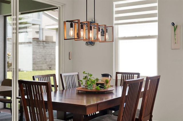 1219 Foltz Loop, Oakland, FL 34787 - dining room with a chandelier