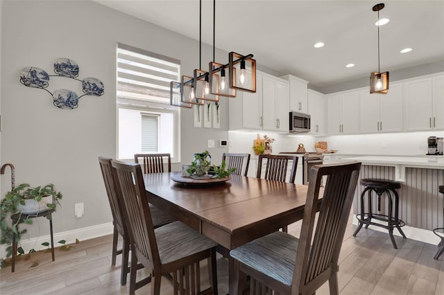 1219 Foltz Loop, Oakland, FL 34787 - dining space with light wood-style flooring and recessed lighting
