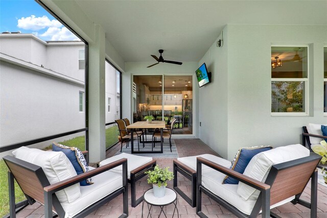 1219 Foltz Loop, Oakland, FL 34787 - sunroom featuring an outdoor hangout area and a ceiling fan