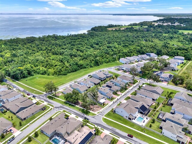 1219 Foltz Loop, Oakland, FL 34787 - aerial view of property's location featuring a nearby body of water and nearby suburban area