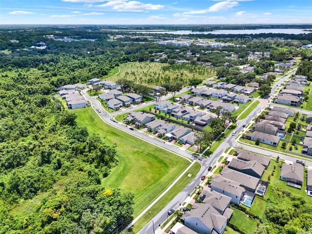 1219 Foltz Loop, Oakland, FL 34787 - aerial view of residential area featuring a nearby body of water