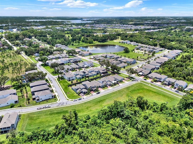 1219 Foltz Loop, Oakland, FL 34787 - aerial perspective of suburban area with a nearby body of water