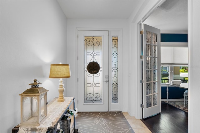 13851 Jomatt Loop, Winter Garden, FL 34787 - entrance foyer featuring wood finished floors and baseboards
