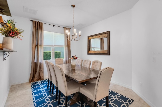 13851 Jomatt Loop, Winter Garden, FL 34787 - dining room with a chandelier and tile patterned flooring