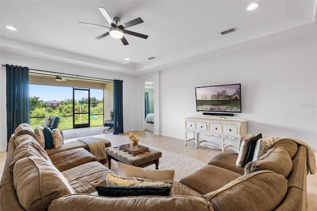 13851 Jomatt Loop, Winter Garden, FL 34787 - living area featuring ceiling fan, recessed lighting, light tile patterned floors, and a textured ceiling