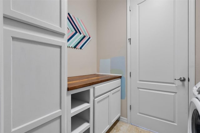 13851 Jomatt Loop, Winter Garden, FL 34787 - laundry room with cabinet space and washer / dryer