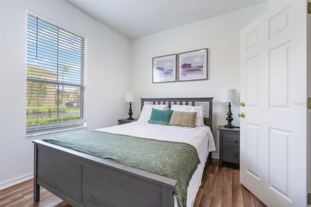 4224 Calabria Ave, Davenport, FL 33897 - bedroom with dark wood finished floors