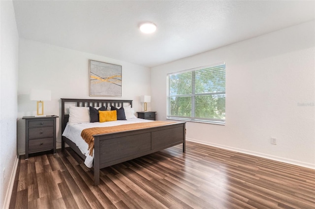 4224 Calabria Ave, Davenport, FL 33897 - bedroom featuring wood finished floors and baseboards