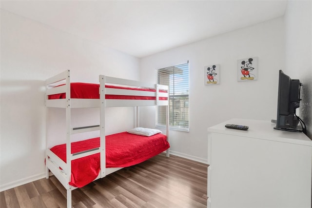 4224 Calabria Ave, Davenport, FL 33897 - bedroom with wood finished floors and baseboards