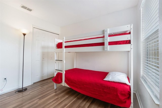 4224 Calabria Ave, Davenport, FL 33897 - bedroom featuring wood finished floors and a closet