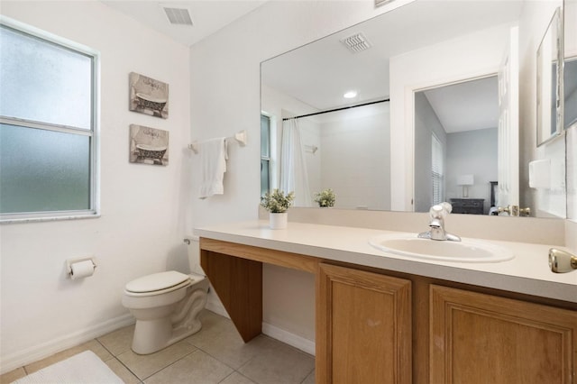 4224 Calabria Ave, Davenport, FL 33897 - ensuite bathroom with tile patterned flooring, vanity, and a shower with shower curtain